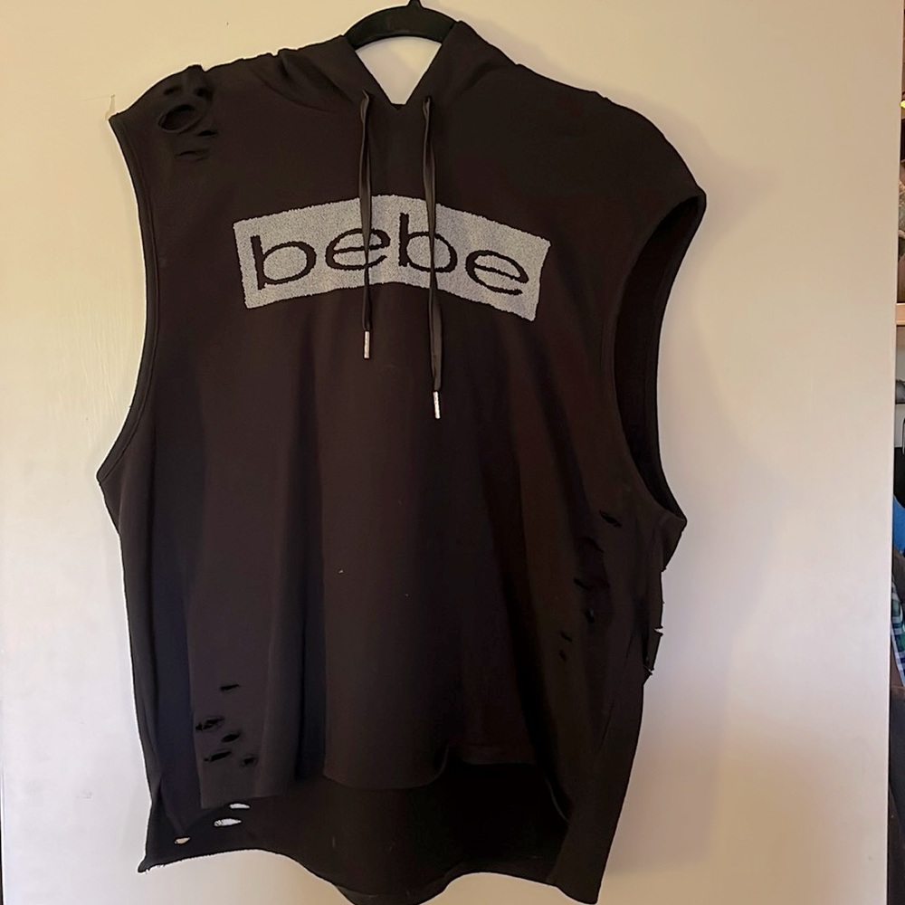 BEBE distressed sleeveless hoodie. True to size!